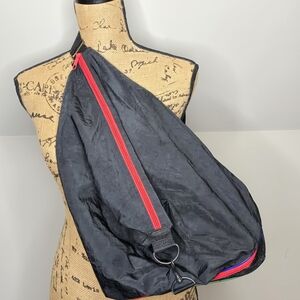 United Colors Of Benetton Black Duffel Bag with Red Accent